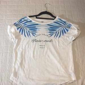 A kids XL. Has nice sayings on it & is soft.